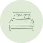 a neatly made bed icon