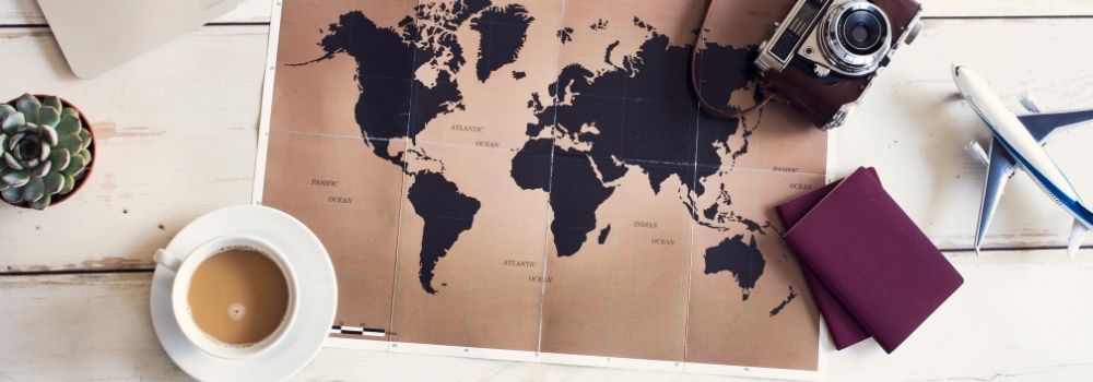 travel plans a map and airline tickets